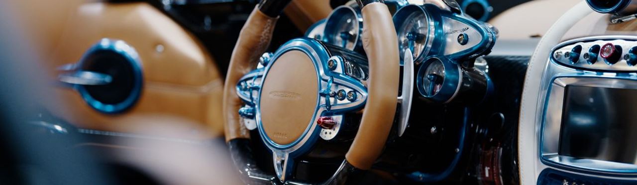Pagani Roadster interior with steering wheel and premium finishes