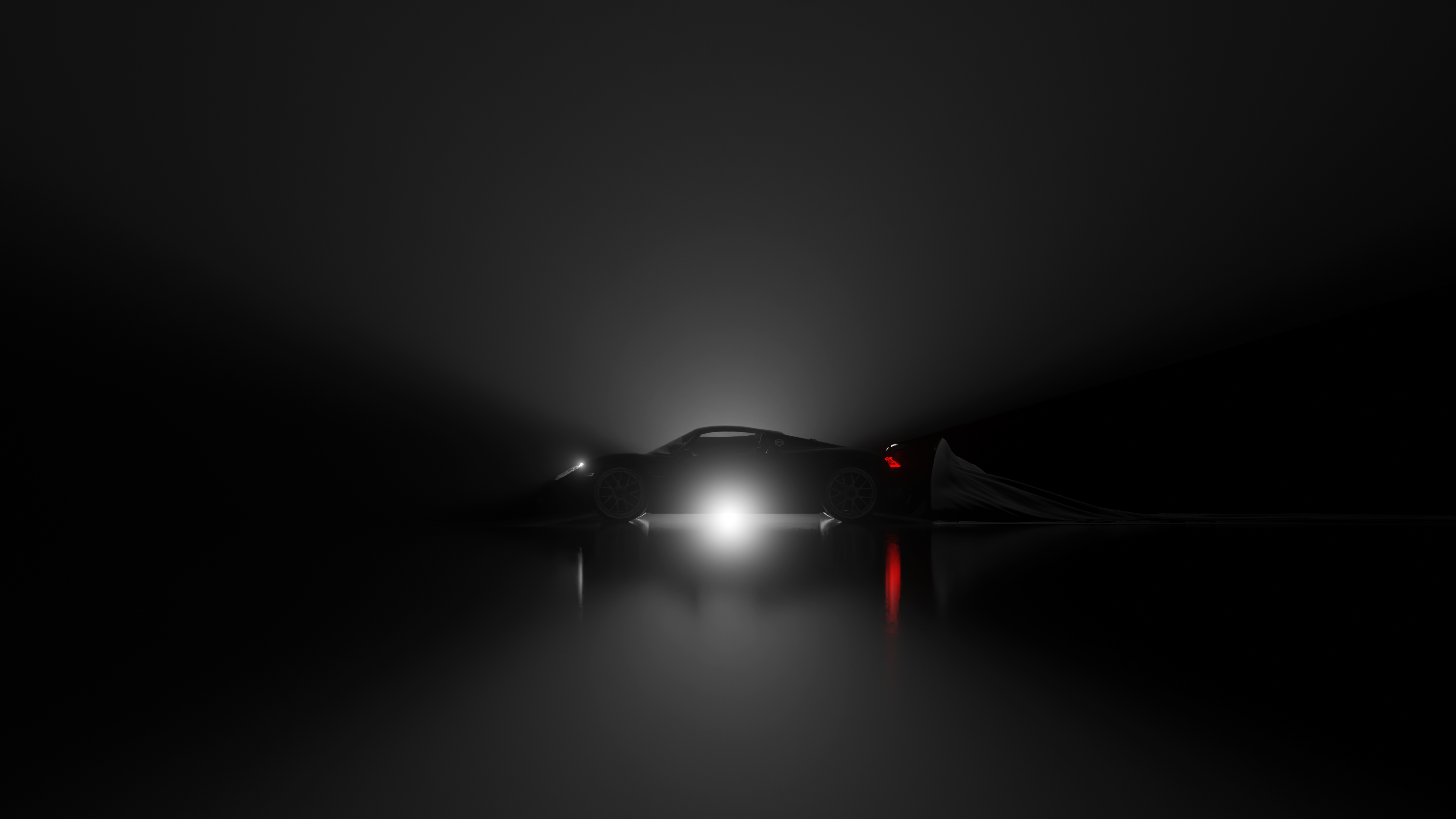 Supercar vue de long avec un fond noir et un projecteur